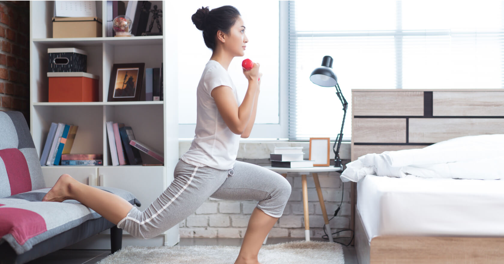 healthy person doing exercize in pristine bedroom