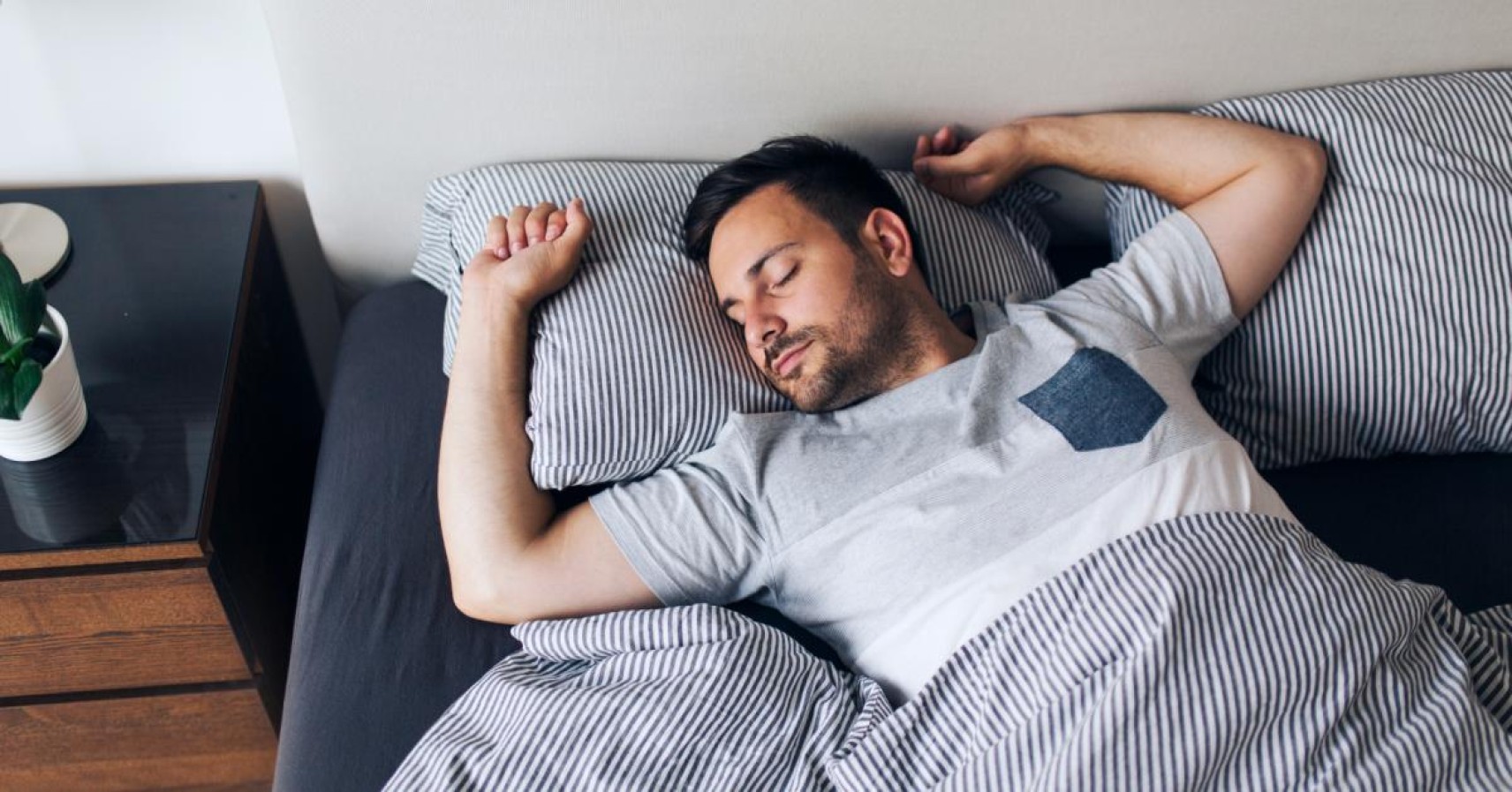 A back sleeper on a comfortable mattress