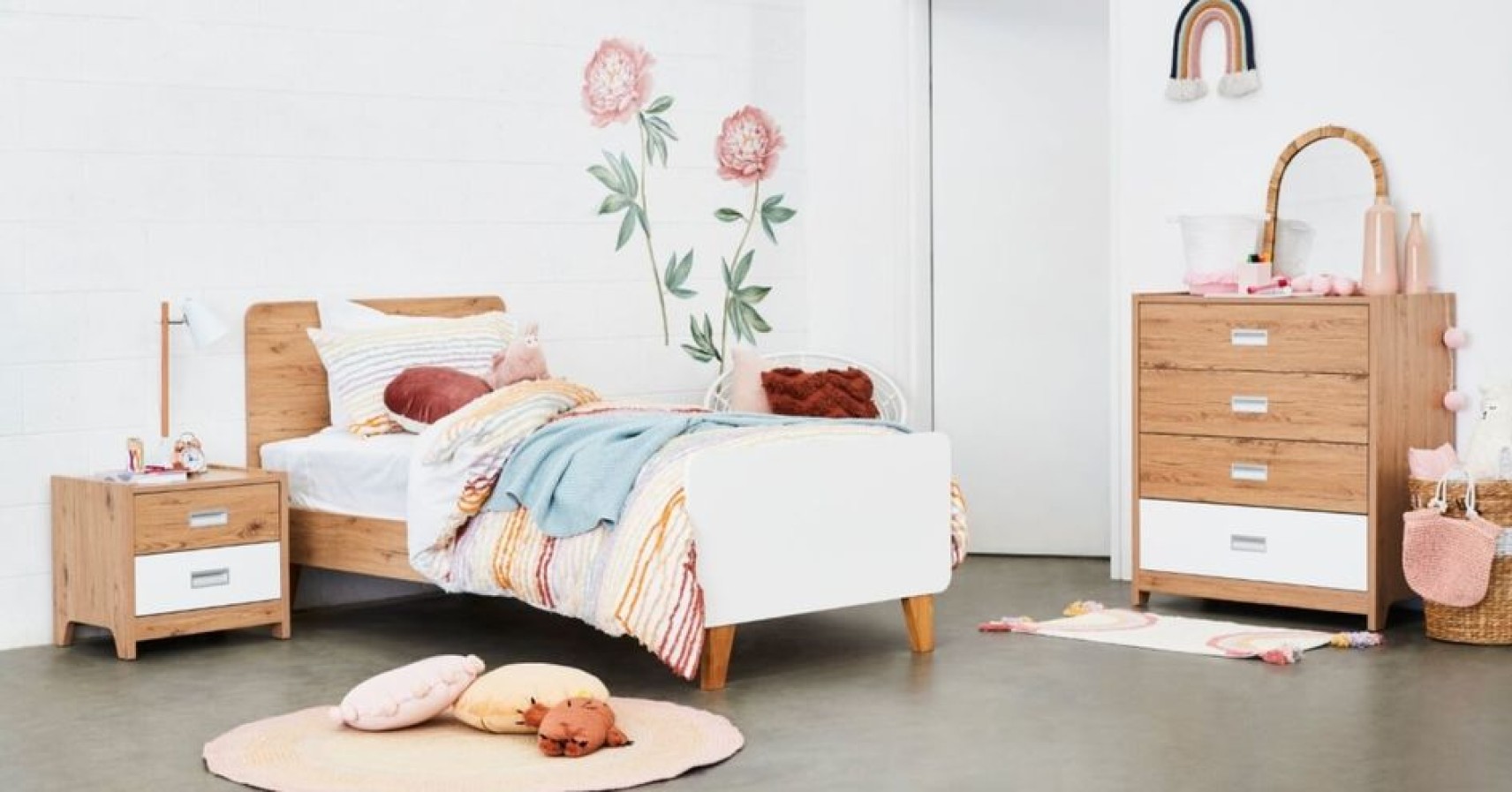 Young girl's bedroom with timber bedroom suite